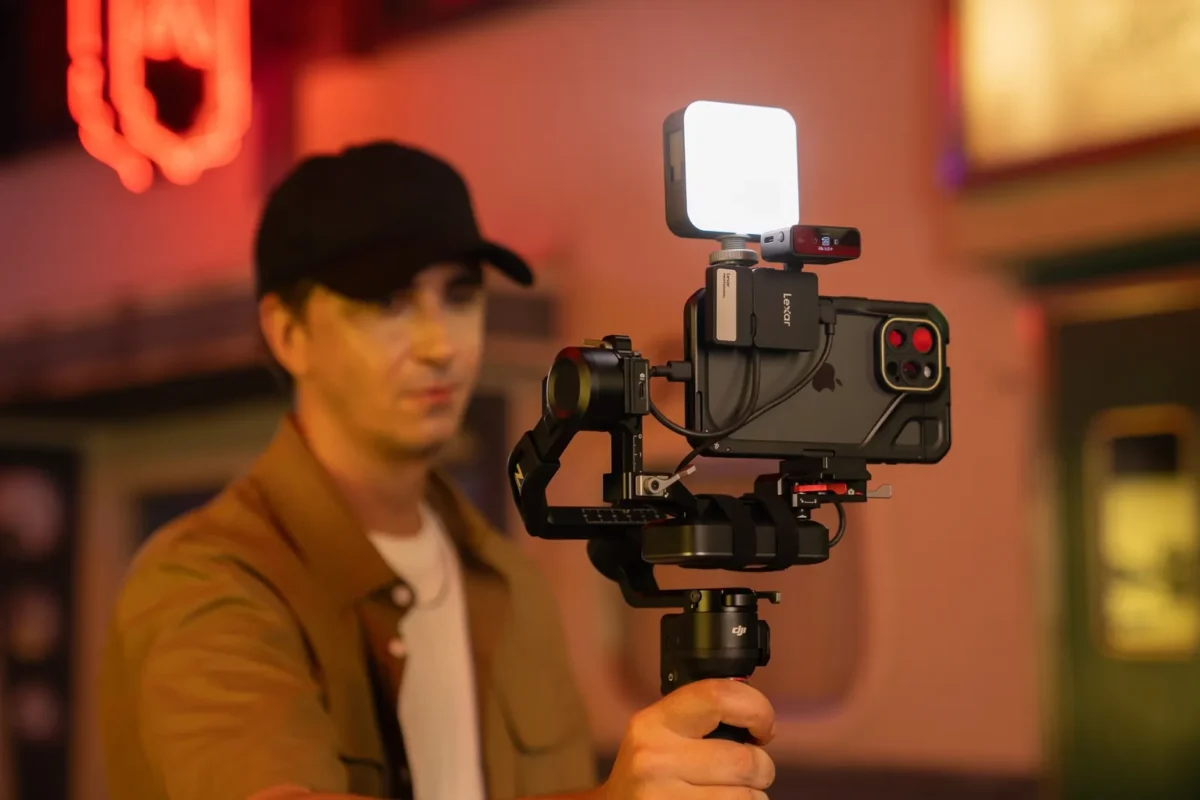 Creator filming with a phone rig recording straight to an SSD