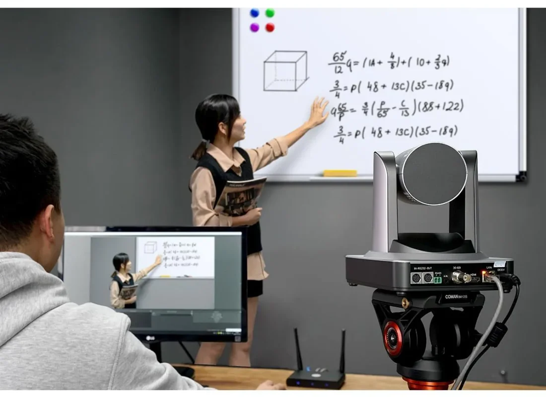 Remote-controlled PTZ camera filming a teacher at a whiteboard