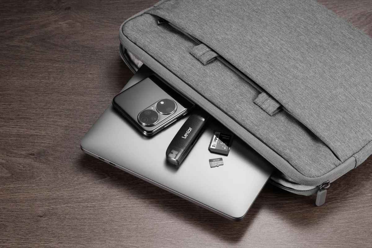 Card reader tucked into the pocket of a laptop sleeve