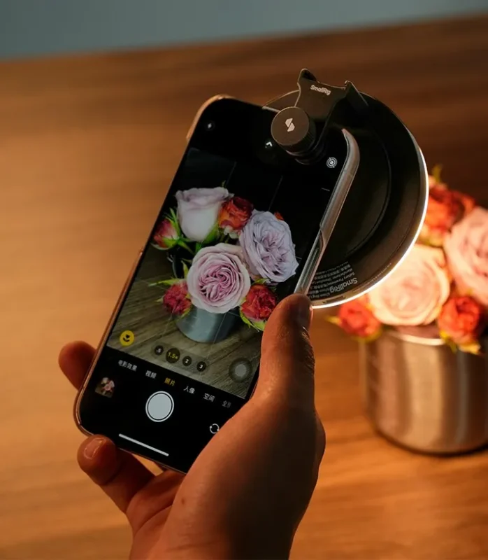 Phone with an attached light photographing flowers up close