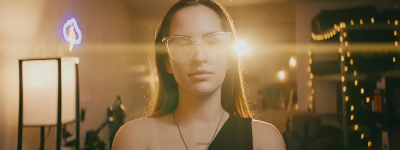 Widescreen portrait in warm light with an anamorphic look