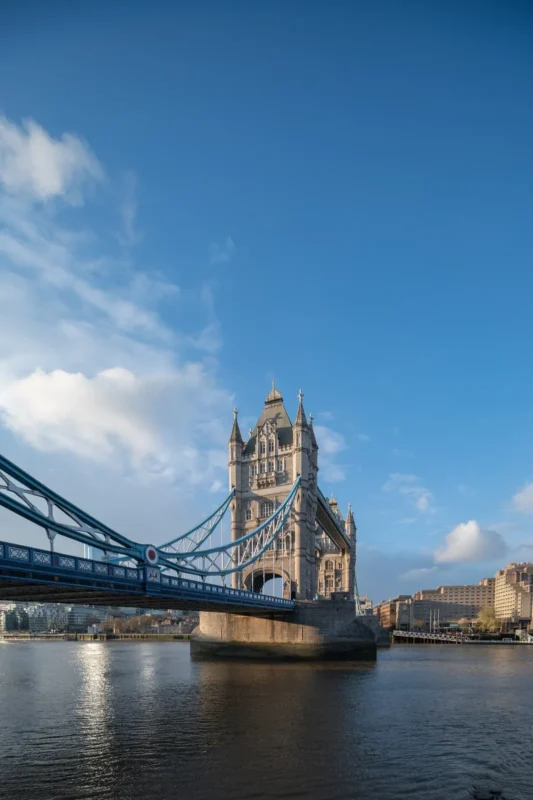 Tower Bridge under a blue sky with straight vertical lines